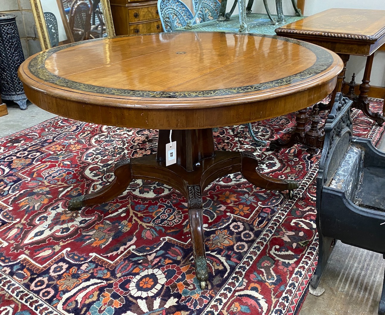 A Regency brass inlaid circular mahogany tilt top breakfast table, diameter 126cm, height 72cm